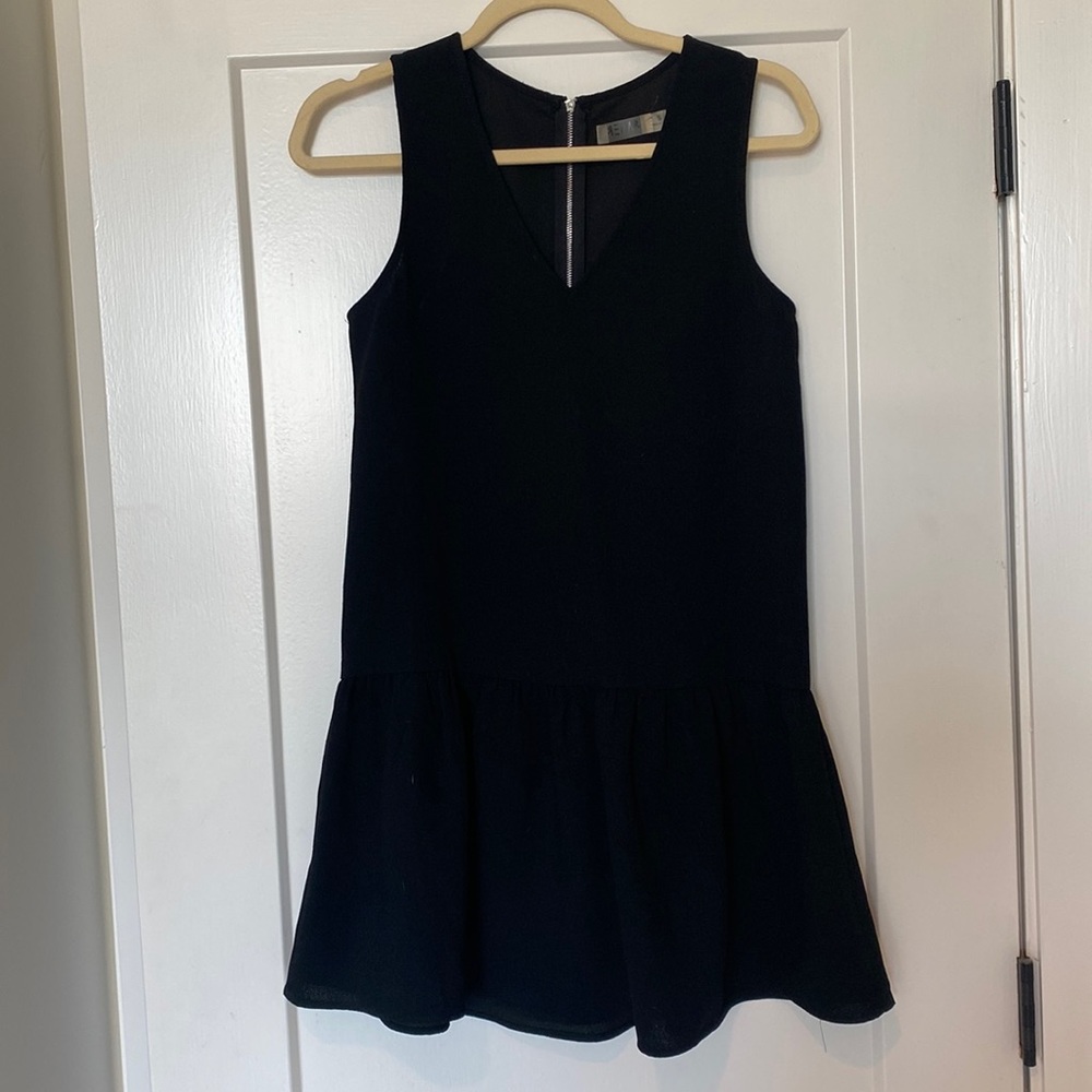 Black dress with flare hem detail